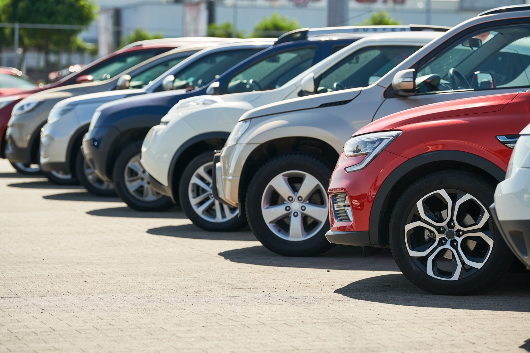 Used Cars and SUVs for Sale in a parking lot